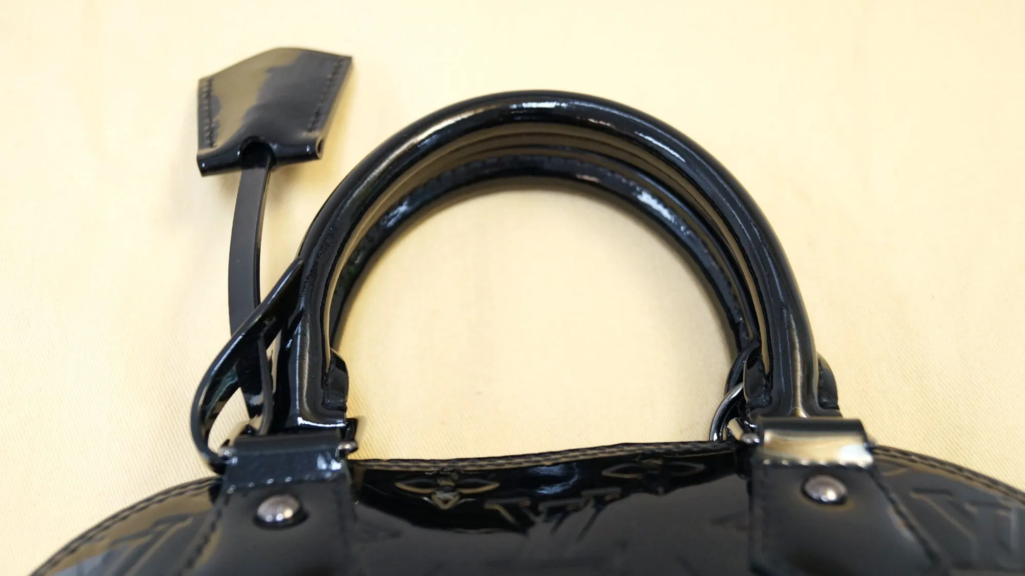 LOUIS VUITTON Black Magnetique Monogram Vernis Alma BB Satchel Bag